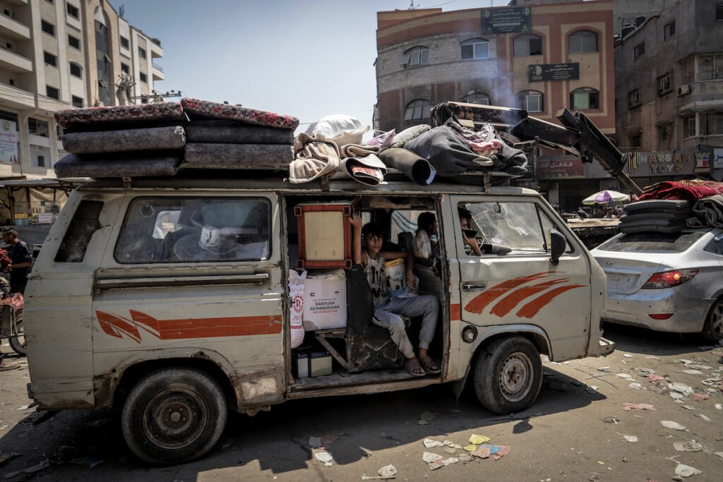 Mass displacement from Gaza City’s northeast begins as Israeli attacks intensify