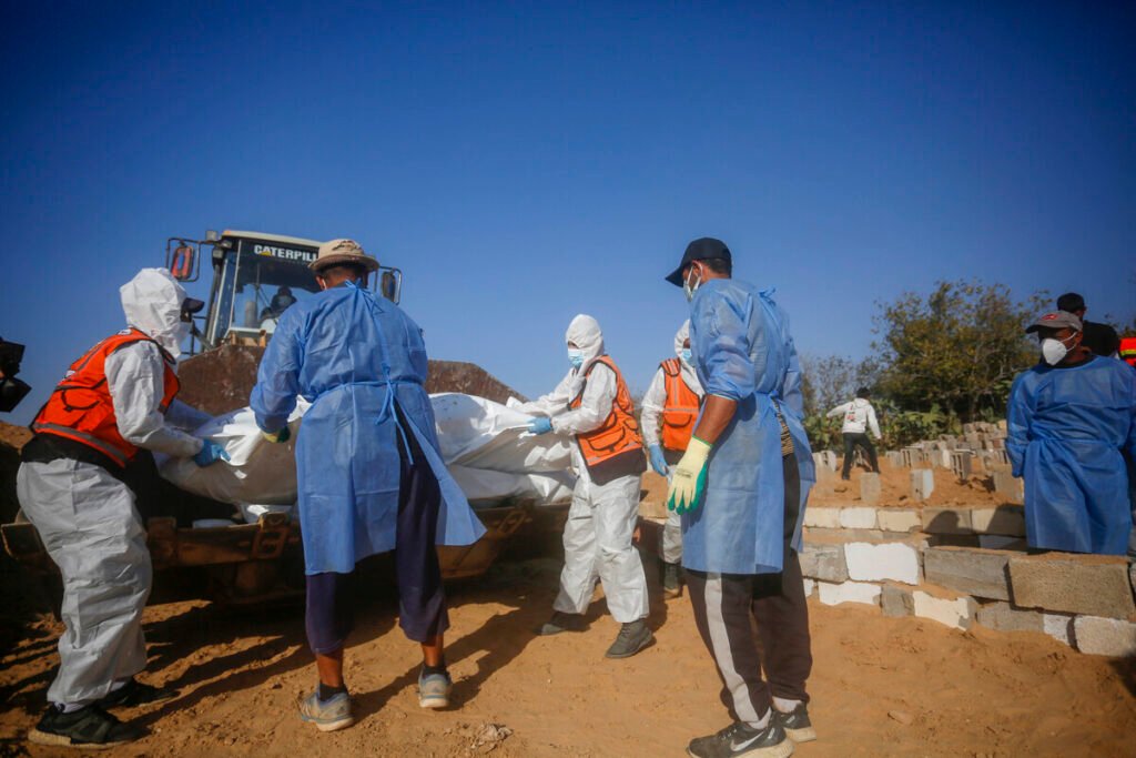 14 more unidentified Palestinian bodies handed over by Israel buried in Gaza