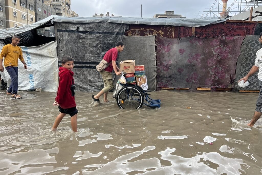 Dozens of tents for displaced Palestinians flooded by heavy rains in southern Gaza