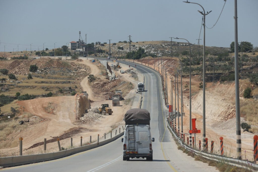 Israeli forces begin paving settlement road near Bethlehem, uproot olive trees west of Jenin