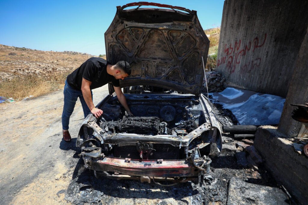 Israeli occupiers torch Palestinian vehicle, attack home in southern West Bank