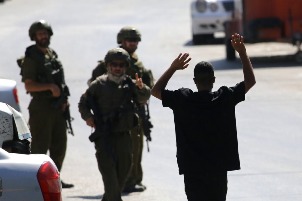 Israeli army arrests 7 Palestinians, assaults 2 in occupied West Bank raids